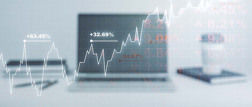 Computer mit Diagrammen, Statistiken und Berechnungen